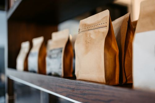 Different-types-of-coffee-sorted-into-paper-bags-packaging-image